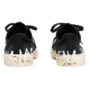 Baskets basses Paris « Coton noir déchiré et caoutchouc blanc avec graffitis » 688754W3RR51099