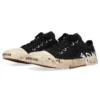 Baskets basses Paris Graffiti « Coton déchiré noir et blanc » 688757W3RR51099