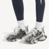Baskets de sport pour femme avec logo en stencil, noir/blanc