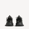 Baskets « Track Piercing » pour homme, couleur noire