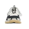 Baskets Triple S « Blanc Noir » 536737W09OM9058