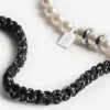 Bracelet/collier ras-du-cou Malibu à perles, noir/blanc/argent brillant Bracelet/collier ras-du-cou Malibu à perles, noir/blanc/argent brillant