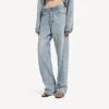 Jean femme à coutures torsadées, bleu clair délavé Jean femme à coutures torsadées, bleu clair délavé