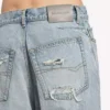 Jean femme à coutures torsadées, bleu clair délavé Jean femme à coutures torsadées, bleu clair délavé