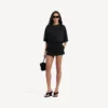 Jupe-short mini ajustée pour femme, en noir