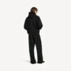 Pantalon de survêtement baggy pour homme noir avec motif « messy spray » Pantalon de survêtement baggy pour homme noir avec motif « messy spray »