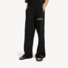 Pantalon de survêtement baggy pour homme noir avec motif « messy spray » Pantalon de survêtement baggy pour homme noir avec motif « messy spray »