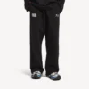 Pantalon de survêtement oversize pour homme Balenciaga | Collaboration NBA, noir/blanc Pantalon de survêtement oversize pour homme Balenciaga | Collaboration NBA, noir/blanc