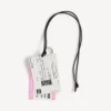 Pendentif/porte-clés pour homme « billet de train » en blanc/noir/rose Pendentif/porte-clés pour homme « billet de train » en blanc/noir/rose
