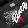 Petit sac à main Rodeo pour femme avec breloques, noir Petit sac à main Rodeo pour femme avec breloques, noir