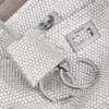 Pochette à bandoulière Rodeo pour femme, ornée de strass, gris fumé Pochette à bandoulière Rodeo pour femme, ornée de strass, gris fumé