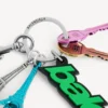 Porte-clés/breloque Balenciaga « Biker » pour femme, vert/noir Porte-clés/breloque Balenciaga « Biker » pour femme, vert/noir