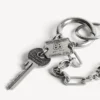 Porte-clés Neverlost pour homme, finition argent antique