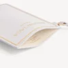 Porte-téléphone « Fragrance » en dix blanc ivoire Porte-téléphone « Fragrance » en dix blanc ivoire