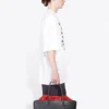 Pull à col rond et manches courtes pour homme Balenciaga avec impression du mot « Word », blanc 641614TJVI39040