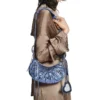 Sac à bandoulière Le Cagole XS métallisé « Violet » 6713090GT3Y5214
