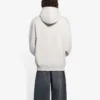 T-shirt à capuche Balenciaga pour homme collection automne-hiver 2021, imprimé logo alphabétique, manches longues, blanc crème 570811TIV552970