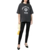 T-shirt à manches courtes avec logo Varsity « Washed Black » 612966TMV981000
