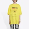 T-shirt pour homme Balenciaga à manches courtes, coupe ample, imprimé logo, style « Dry Cleaning », jaune 651795TKVF87175