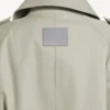 Trench-coat femme à double boutonnage, couleur beige clair Trench-coat femme à double boutonnage, couleur beige clair