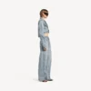 Jean femme à coutures torsadées, bleu clair délavé Jean femme à coutures torsadées, bleu clair délavé