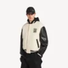 Veste universitaire pour homme Balenciaga | Collaboration NBA, couleur ivoire Veste universitaire pour homme Balenciaga | Collaboration NBA, couleur ivoire
